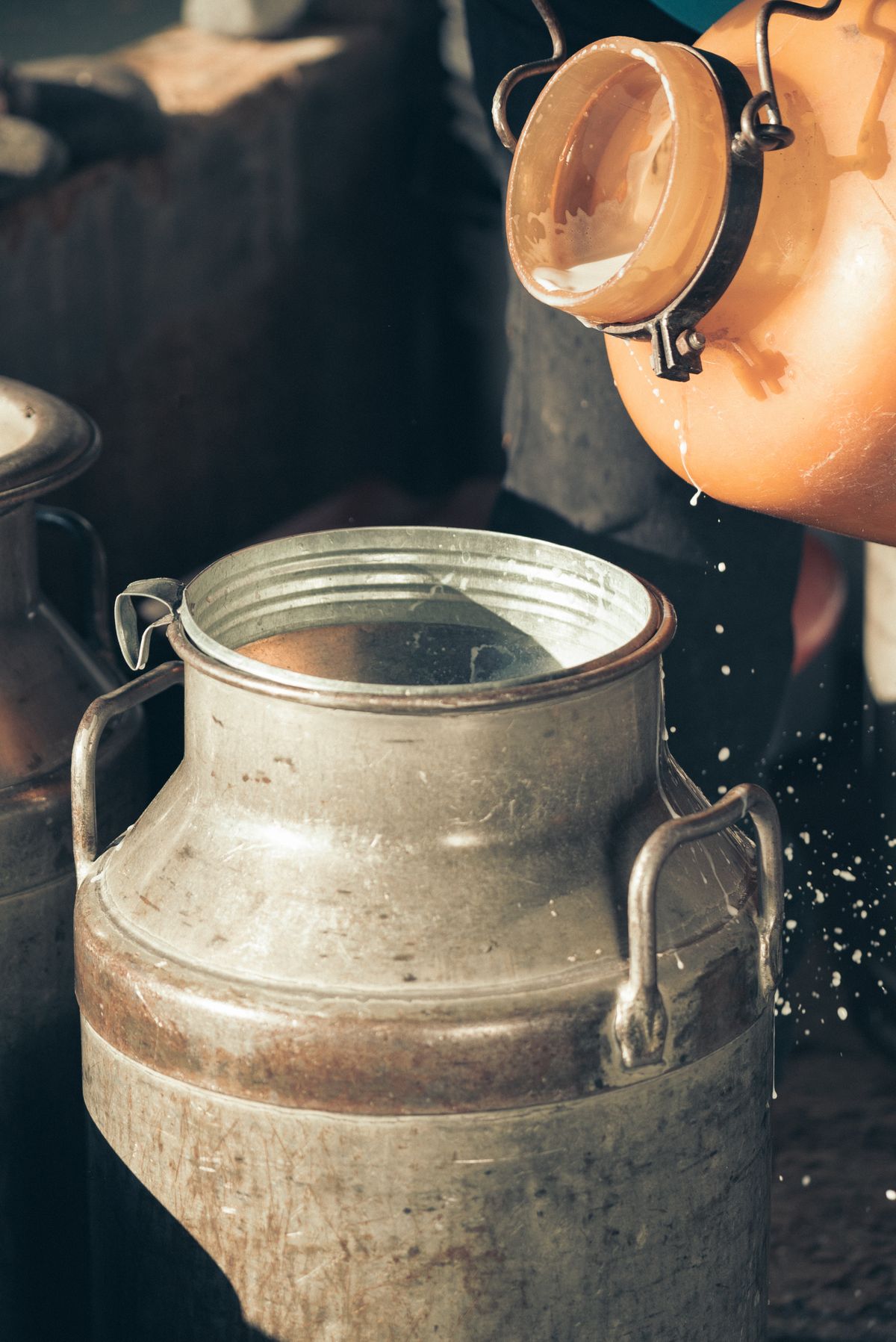 Milk being poured into a container